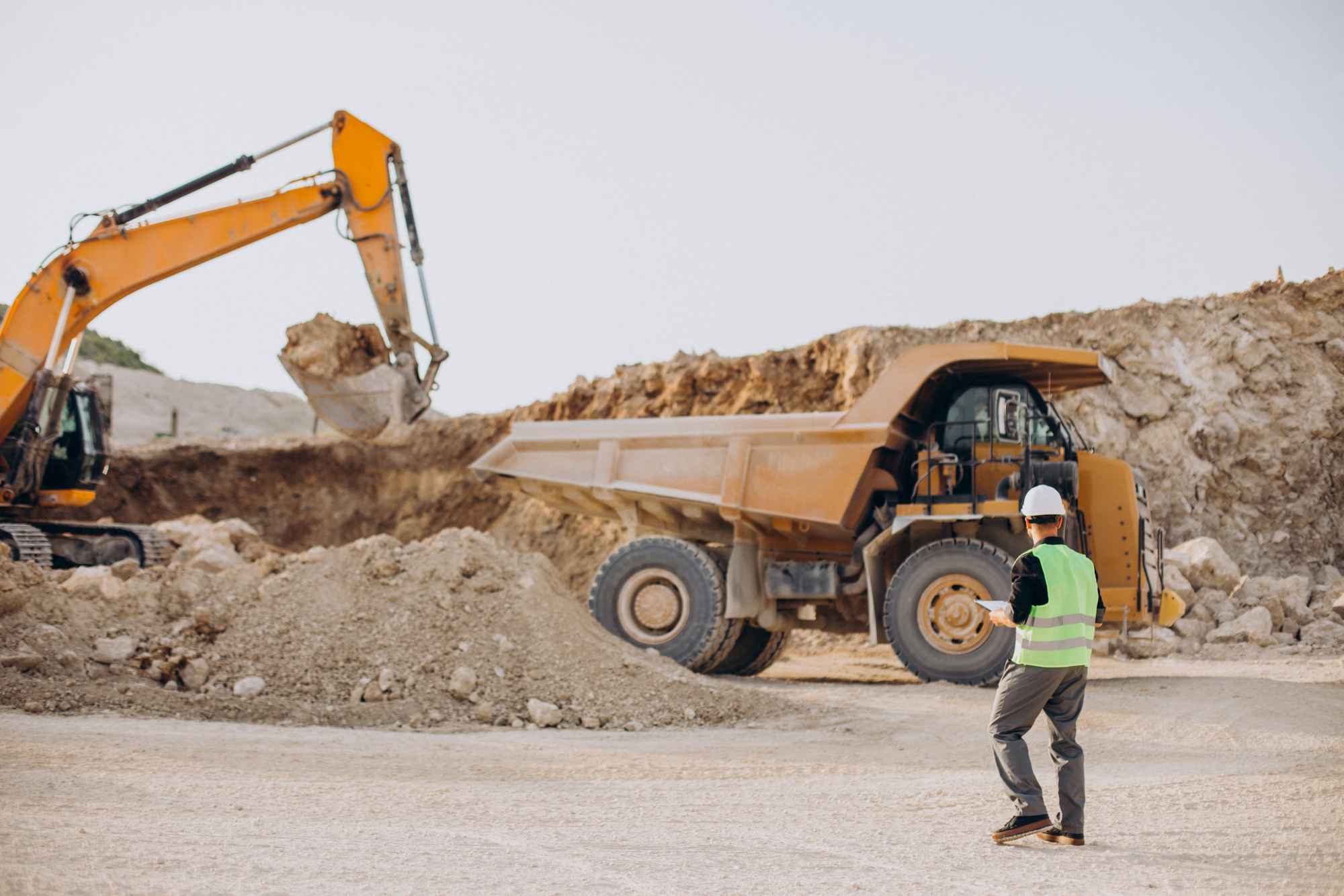 Coal mine worker operating heavy machinery