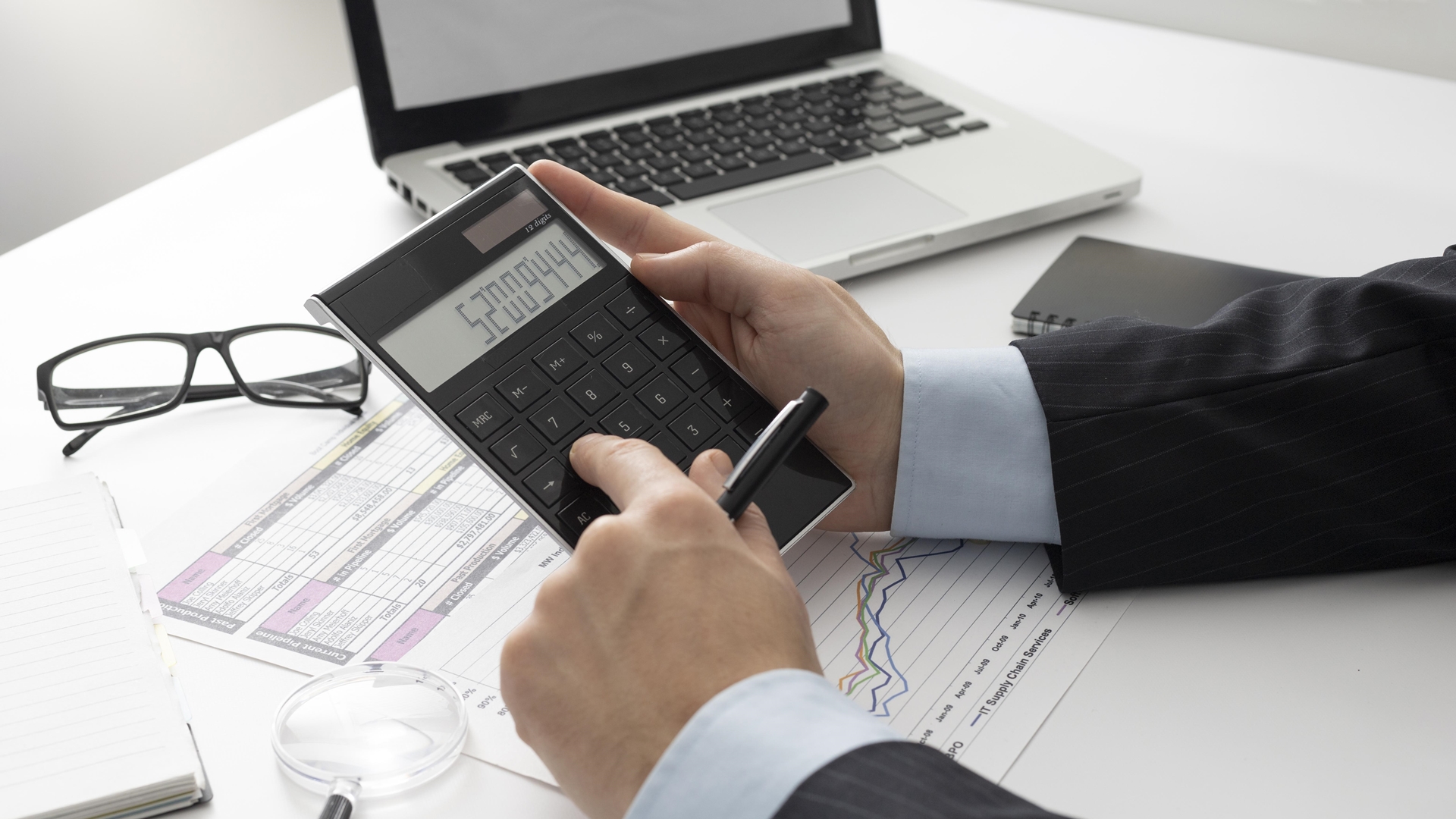Man Calculating Compensation for Impairment of the Whole Person Man Calculating Compensation for Impairment of the Whole Person