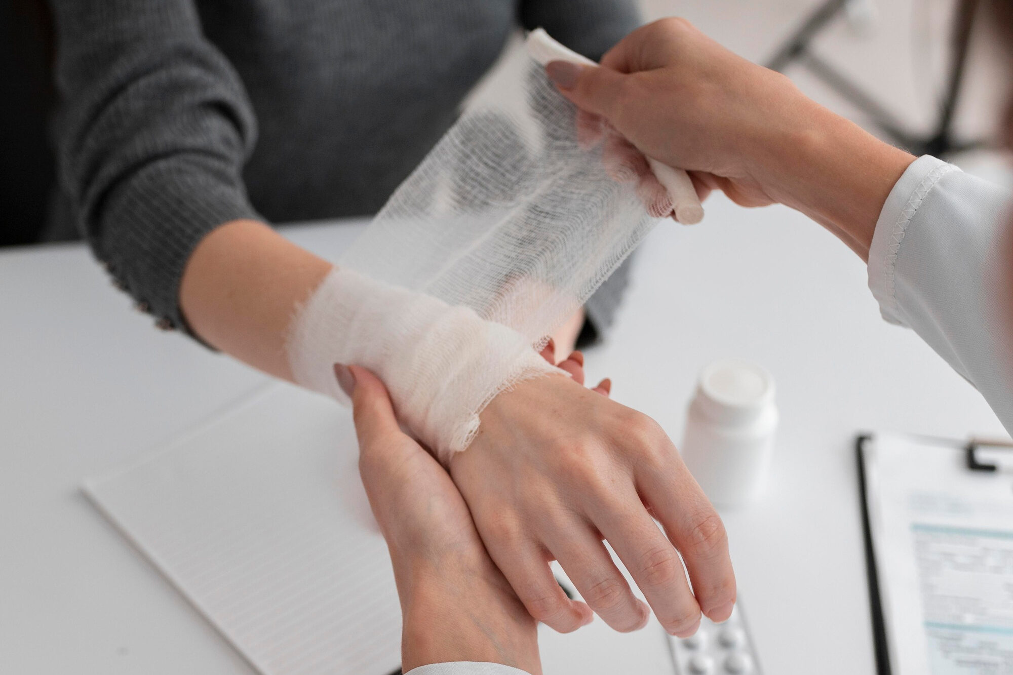 Doctor handling patient’s hand with carpal tunnel Doctor handling patient's hand with carpal tunnel injuries