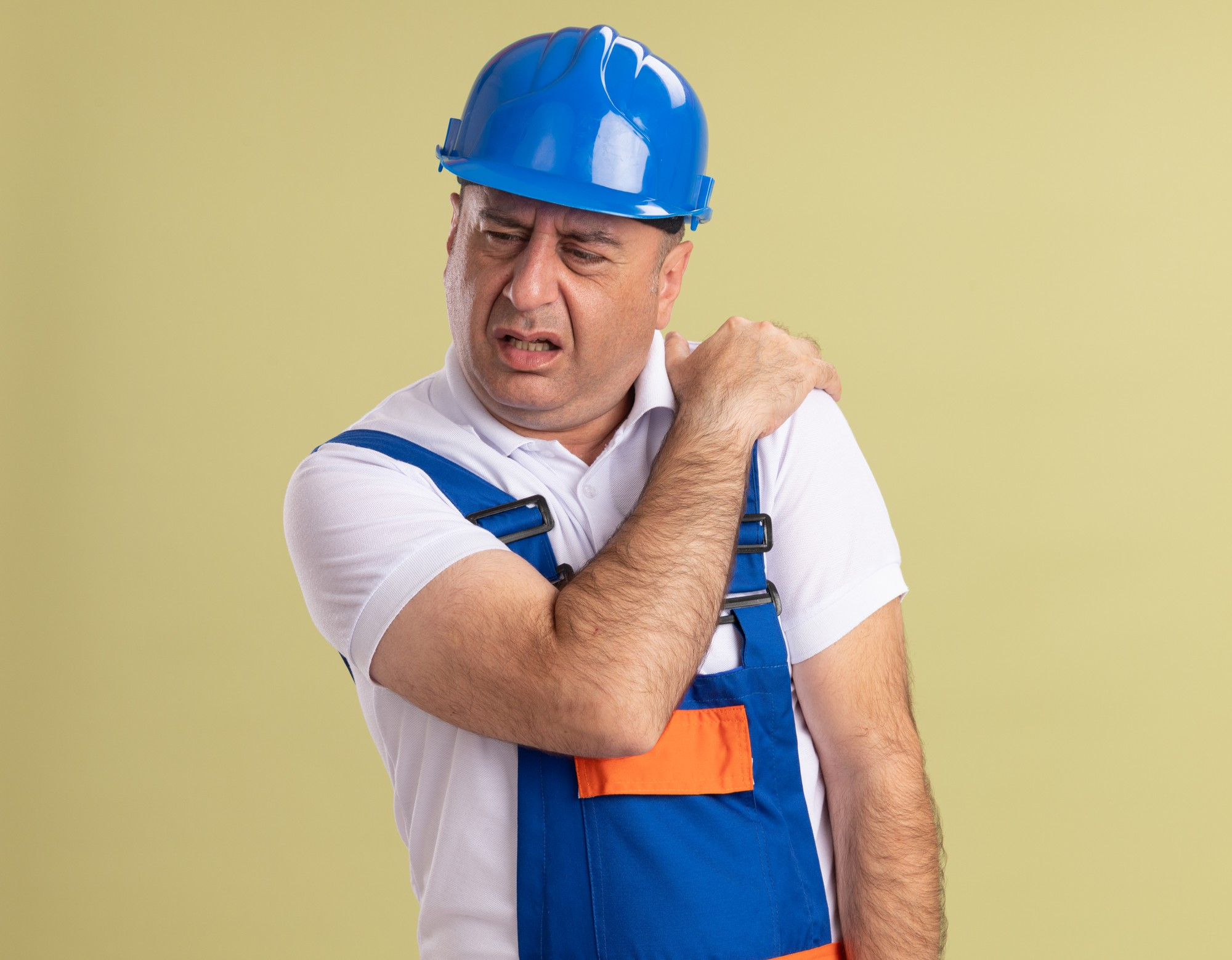 worker suffering from shoulder injuries worker suffering from shoulder injuries